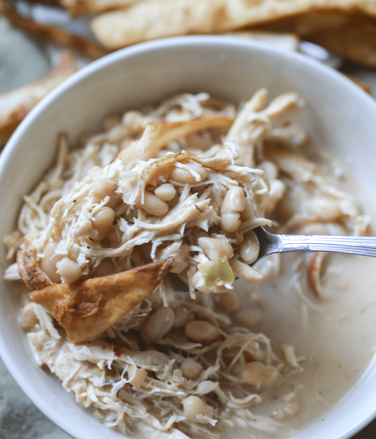 Creamy white chicken chili made with shredded chicken, white beans, and cream cheese